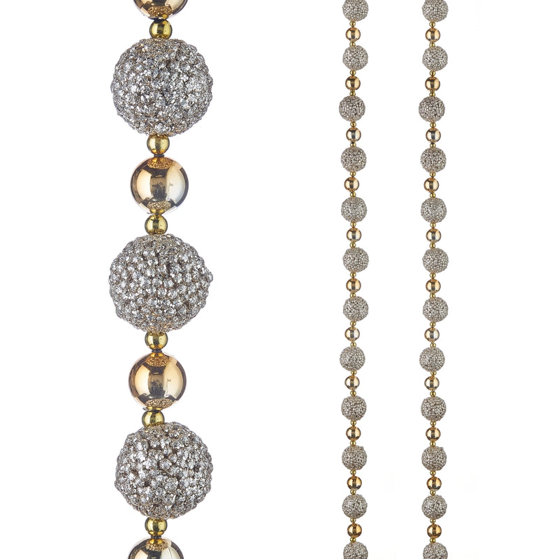 Garland with silver and gold beads on a white background