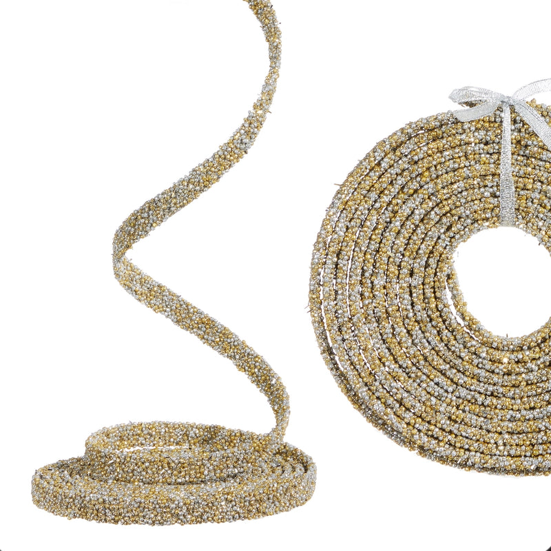 Gold and silver beaded cord on a white background