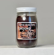 Jar of ground coffee with a label on a gray background