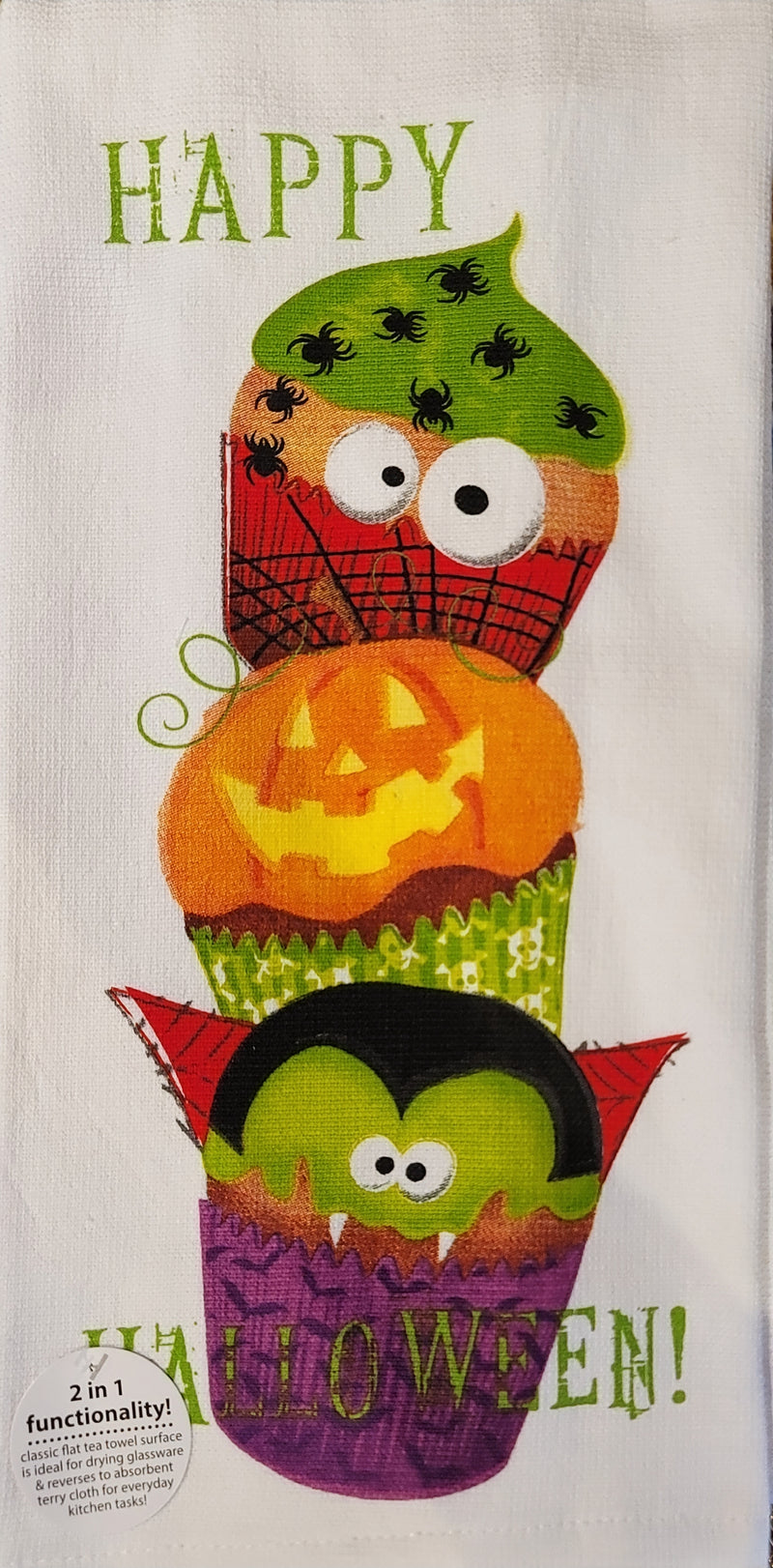 Halloween-themed towel with colorful owl design and pumpkins on a white background
