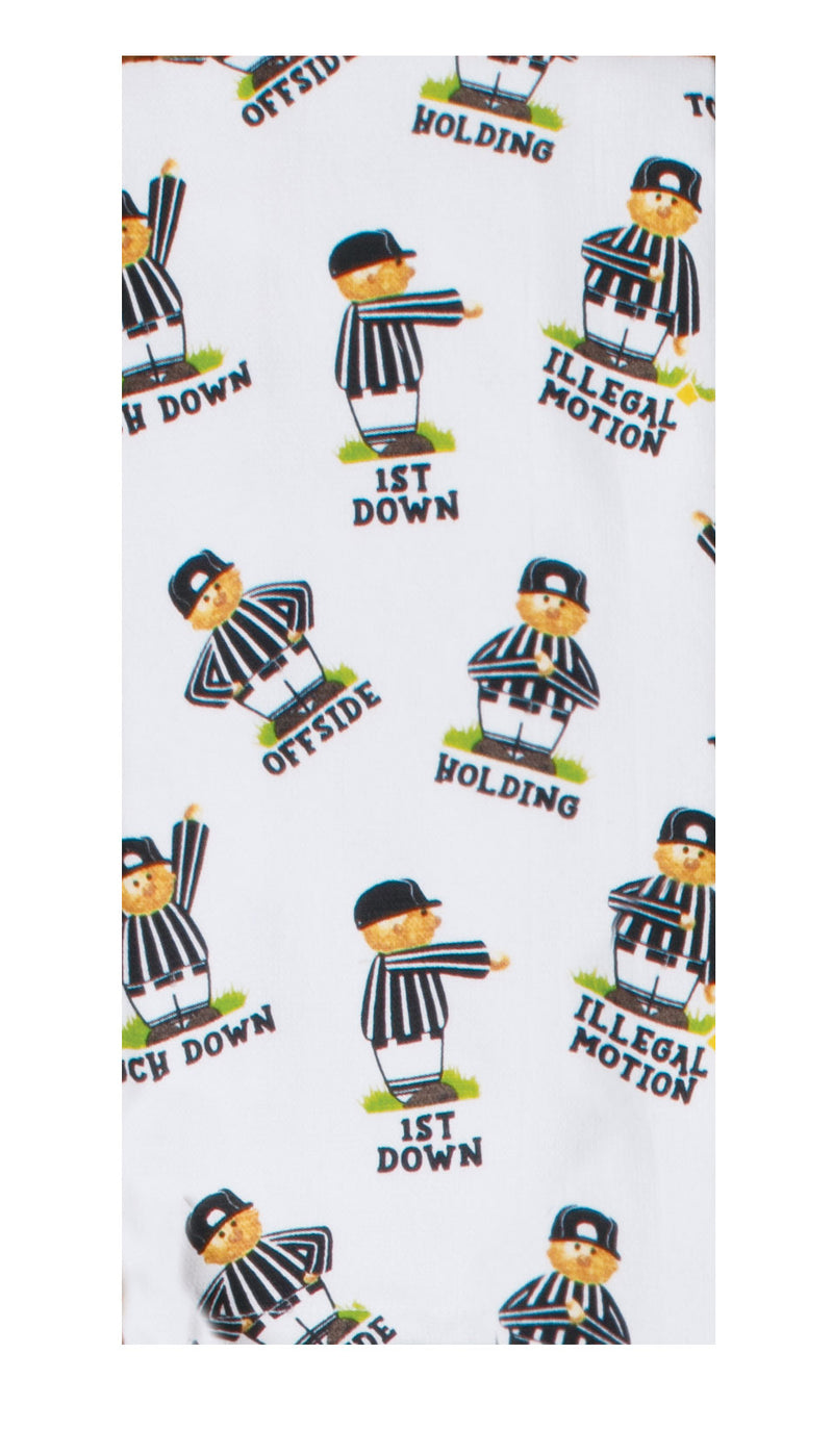 White towel with cartoon referee design and text on a white background