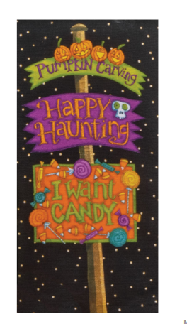 Halloween-themed decorative sign with pumpkins, candy, and text on a black background.