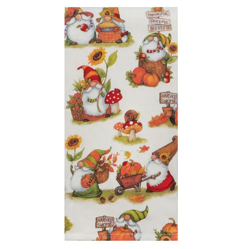 Fabric with autumn-themed design featuring gnomes, pumpkins, and sunflowers on a white background.