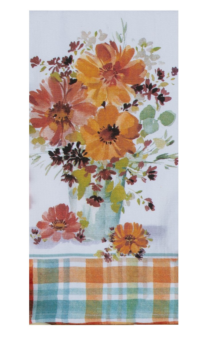 Floral and plaid patterned fabric with orange and yellow flowers on a white background