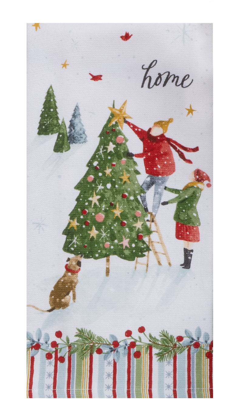 Festive towel with children decorating a Christmas tree and the word 'home'.