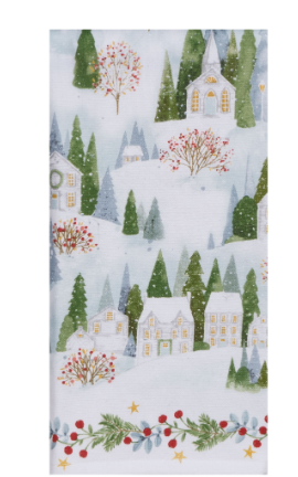 A towel with a winter village scene, featuring trees, houses, and snow, on a white background.