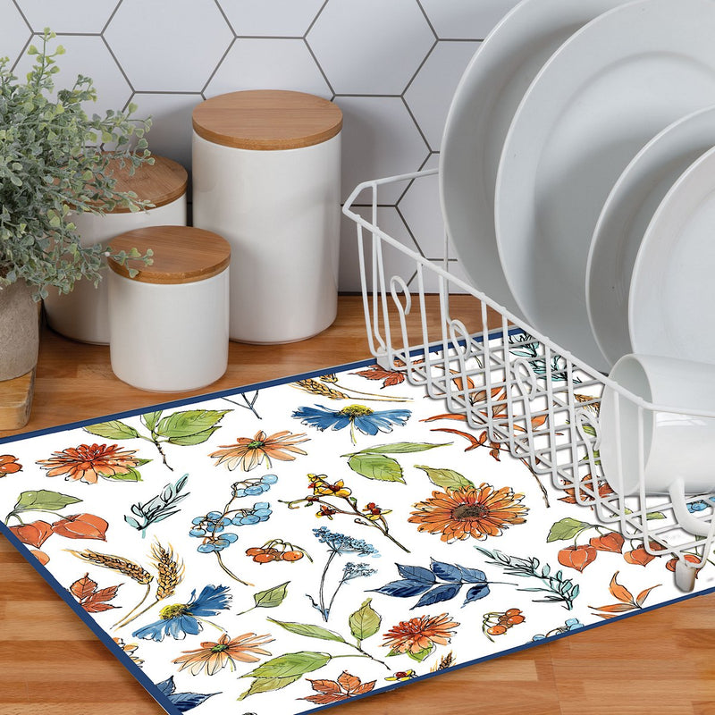 Floral patterned rug on a wooden floor with a dish rack and decorative items in the background.