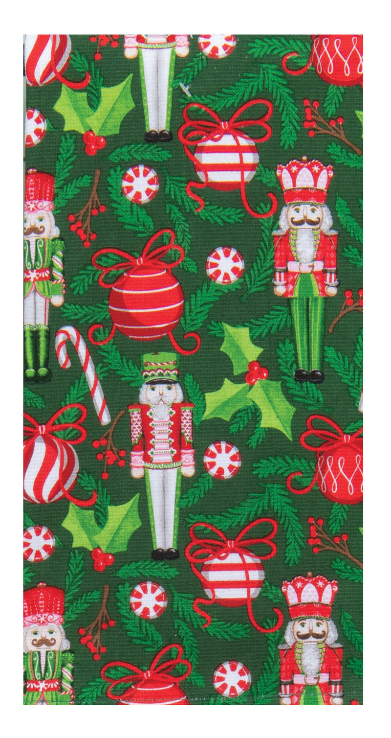 Christmas-themed fabric with nutcrackers, candy canes, and holly on a green background