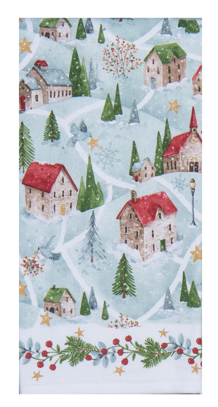 Christmas-themed fabric with winter village pattern featuring houses, trees, and snow.