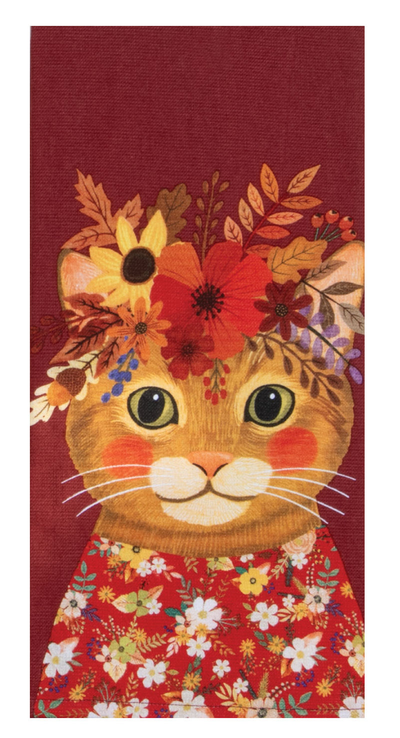 Cat with floral headband and outfit on a red background