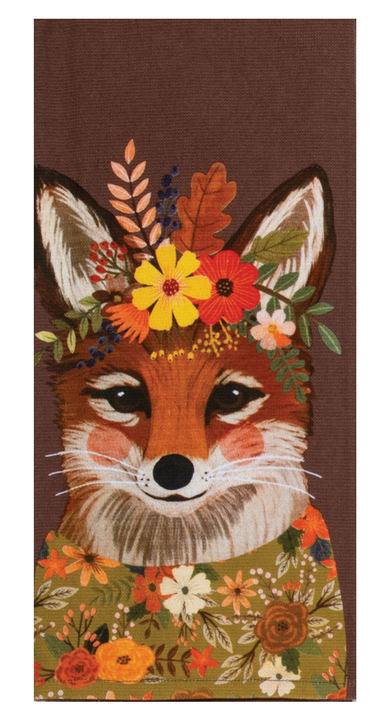 Decorative towel with a fox face and floral design on a brown background