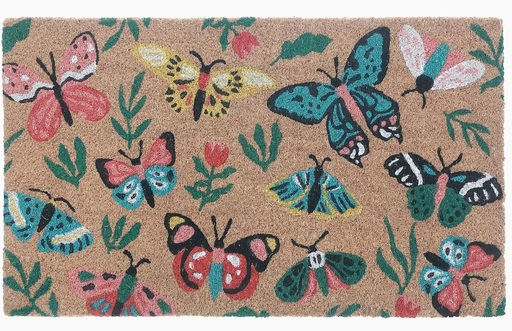 Doormat with colorful butterfly design on a natural background