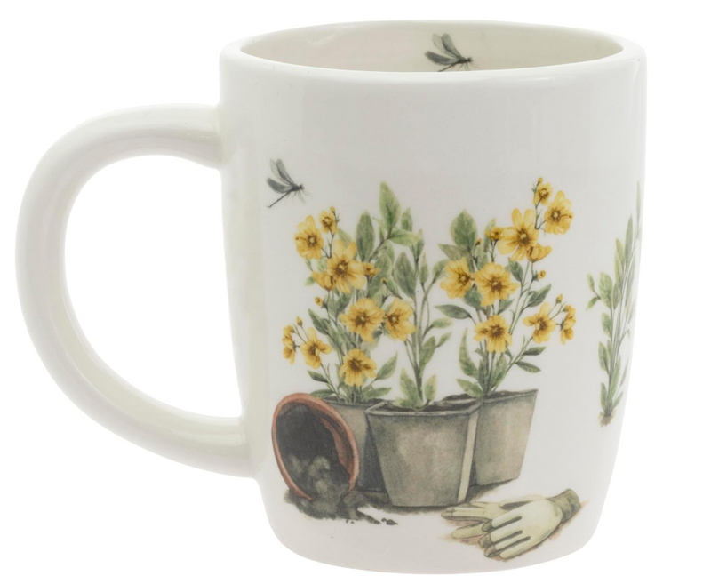 White mug with gardening-themed design featuring flowers, pots, and gloves on a white background