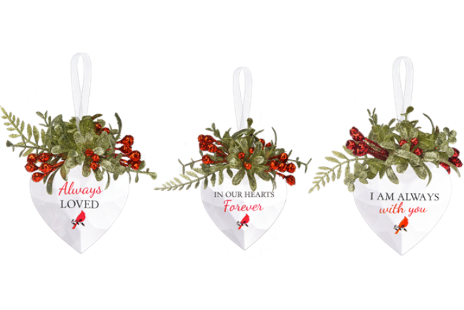 Three heart-shaped ornaments with floral designs and sentimental phrases on a white background