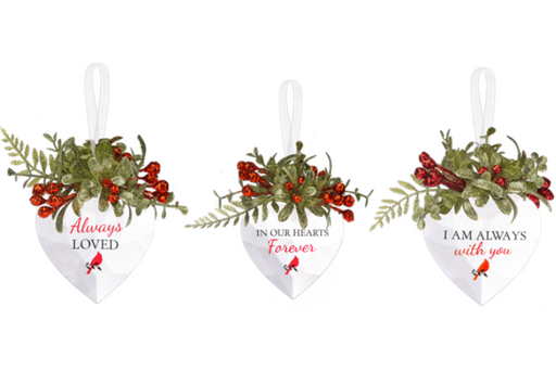 Three heart-shaped ornaments with floral designs and sentimental phrases on a white background