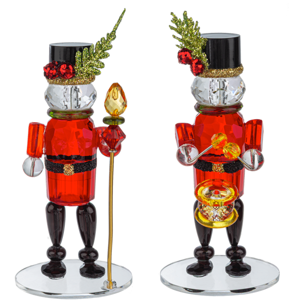 Two decorative nutcrackers with red bodies, black legs, and gold accents on a white background.