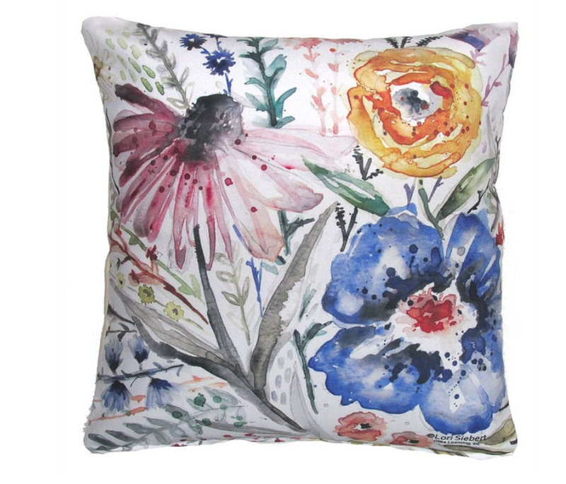Floral-patterned pillow with watercolor flowers on a white background