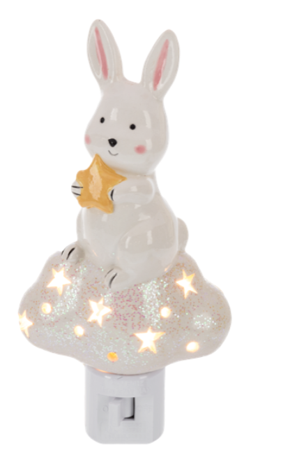 Ceramic rabbit night light with a star on a white background