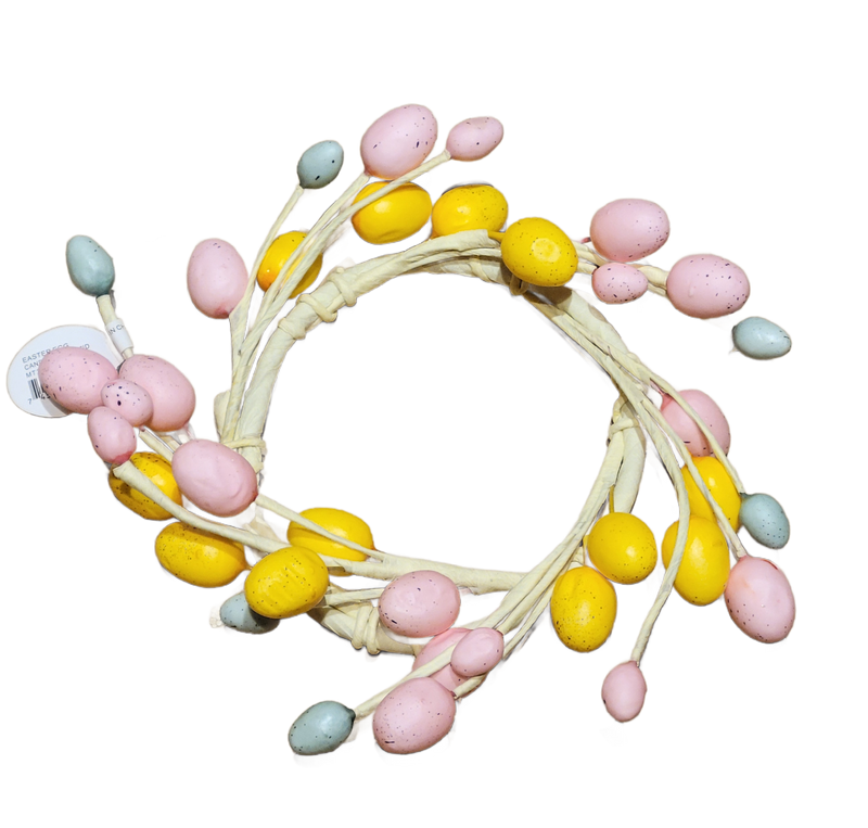 Decorative wreath with pastel-colored berries on a clear background