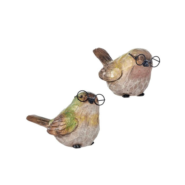Two bird figurines with glasses on a white background