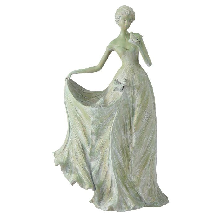 Statue of a woman in a flowing dress on a white background