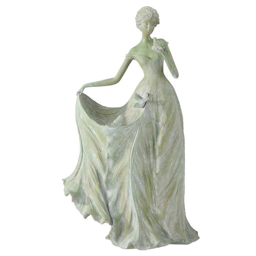 Statue of a woman in a flowing dress on a white background