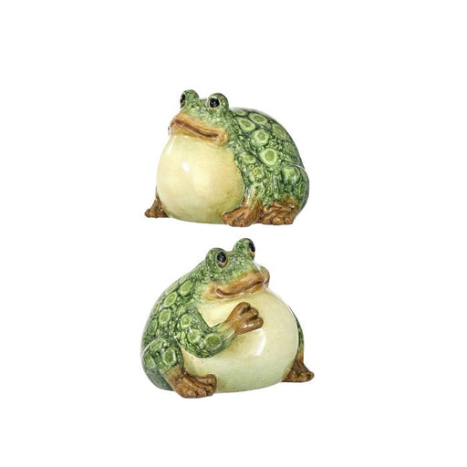 Two green frog figurines on a white background
