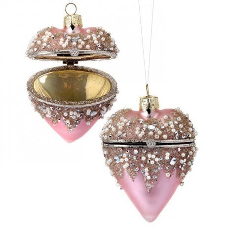 A glass beaded heart locket ornament in a pink color, with a silver-colored frame and a pearl-like beaded chain.