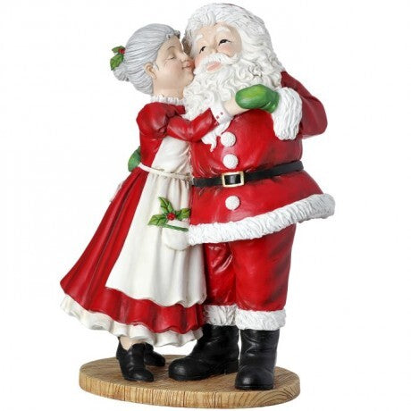 Mrs. Claus Kissing Santa
