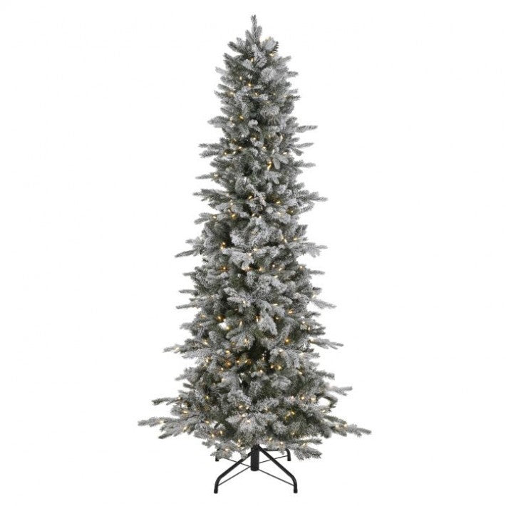 A tall, flocked artificial Christmas tree with warm white string lights, standing on a black metal stand against a plain white background.