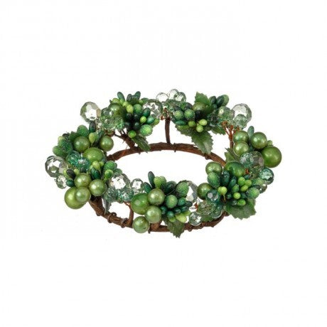 Decorative wreath with green berries and clear beads on a white background