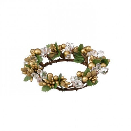 Decorative wreath with gold balls, green leaves, and clear berries on a white background