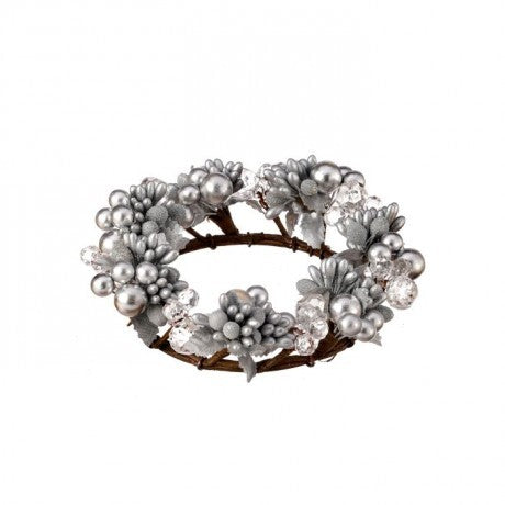 Decorative wreath with pearls and flowers on a white background
