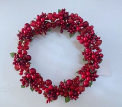 Red berry wreath on a white background