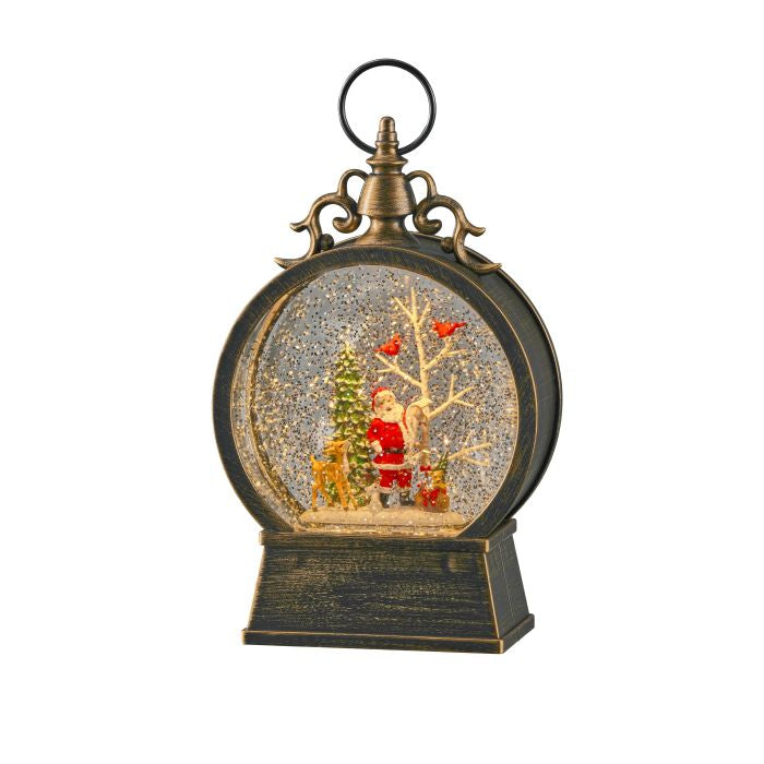 Decorative snow globe with Santa Claus and Christmas tree on a white background