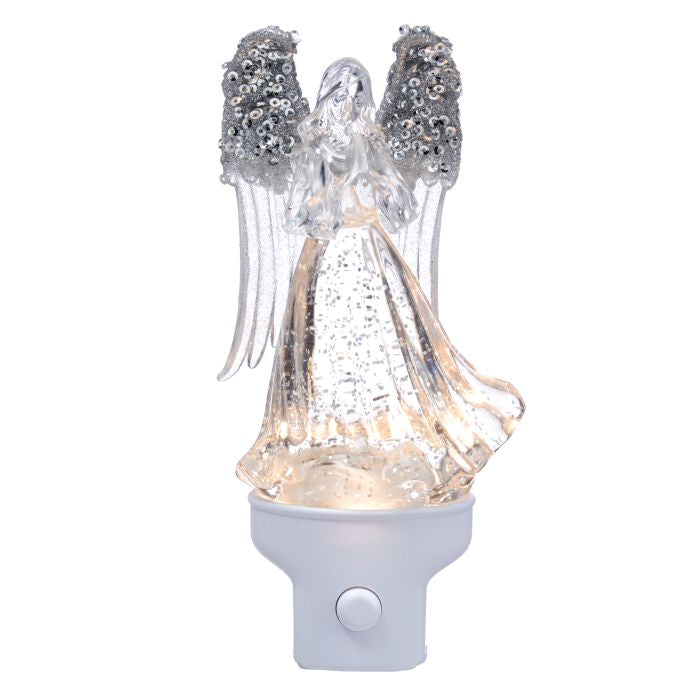 Decorative angel night light with sequined wings on a white background
