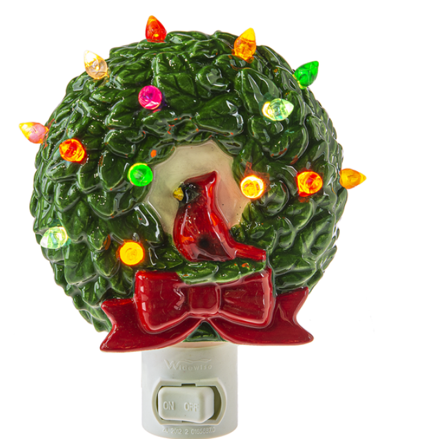 Christmas wreath night light with colorful lights on a white background