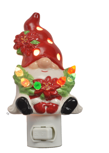 Decorative gnome night light with red hat and flower decorations on a white background