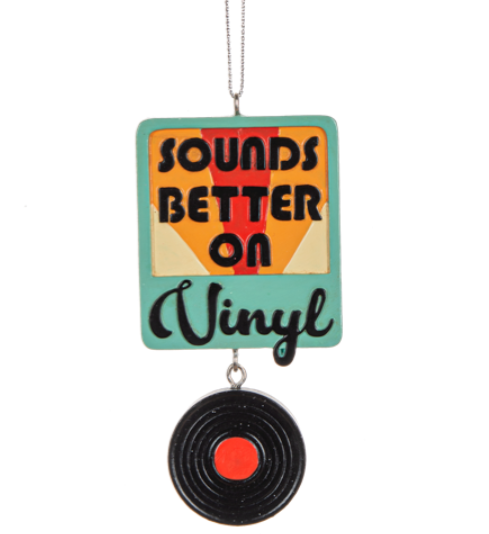 Neon sign with 'Sounds Better on Vinyl' text and vinyl record design on a white background