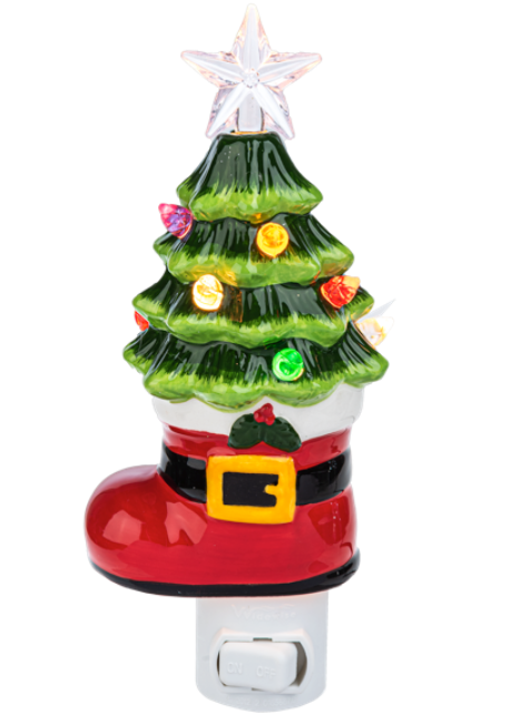 Decorative Christmas tree night light in a red boot with colorful ornaments on a white background