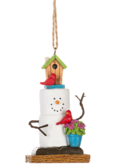 Decorative ornament resembling a snowman with a birdhouse and birds on a white background