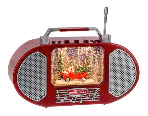 Red vintage-style radio with a Christmas scene inside on a white background
