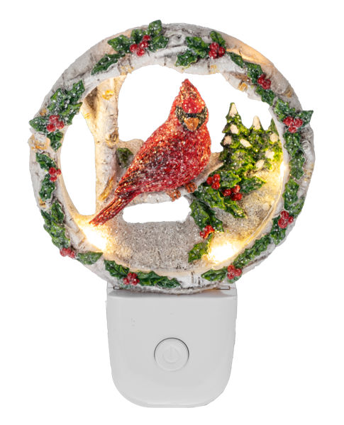 Decorative night light with a cardinal bird design on a white background
