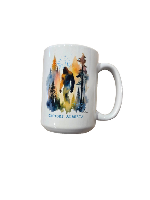 Mug with a bear and forest design and text on a white background