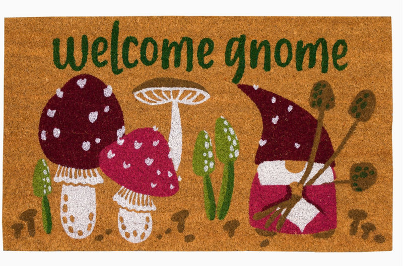 Doormat with 'welcome gnome' text and mushroom and gnome design on a brown background