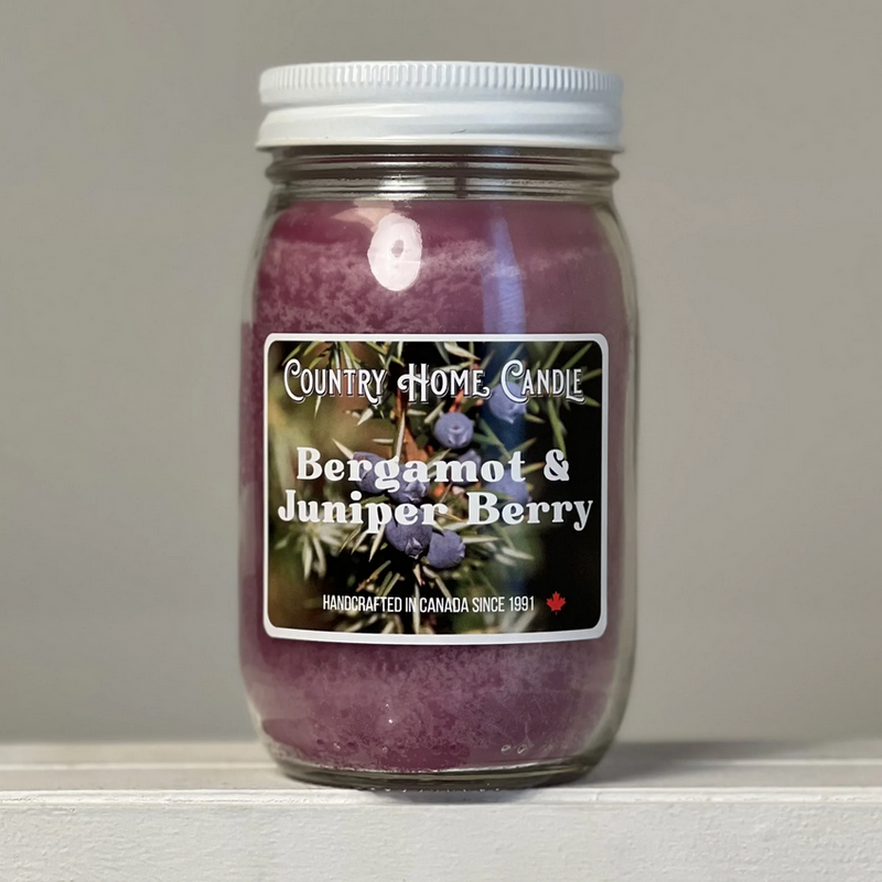 Jar of Country Home Candle Bergamot & Juniper Berry candle on a neutral background