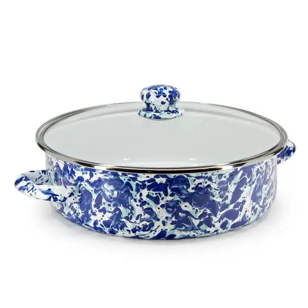 Blue and white patterned casserole dish with glass lid on a white background