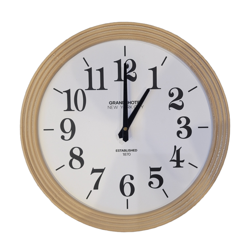 Round wall clock with beige frame and white face displaying black numbers and hands.