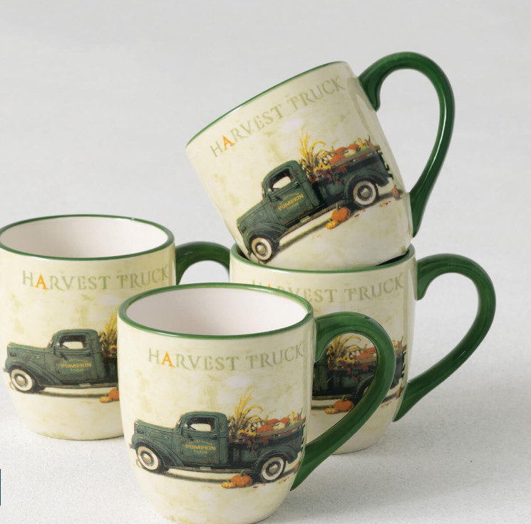 Set of three ceramic mugs with 'Harvest Truck' design on a white background