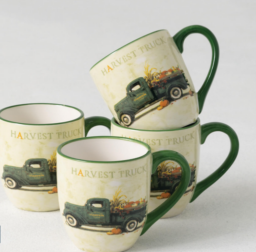 Set of three ceramic mugs with 'Harvest Truck' design on a white background